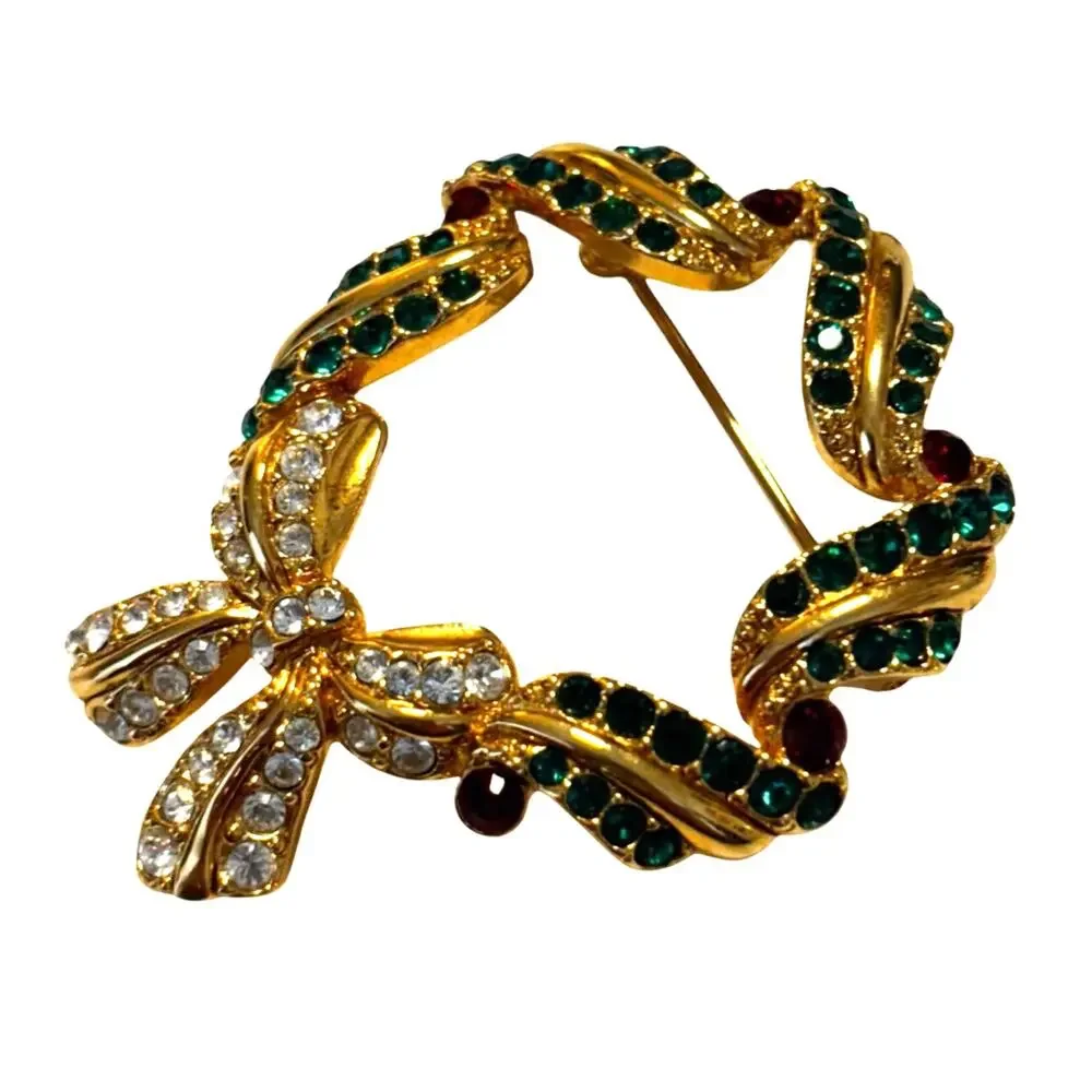 Vintage Monet Christmas brooch gold with green red white rhinestones wreath pin